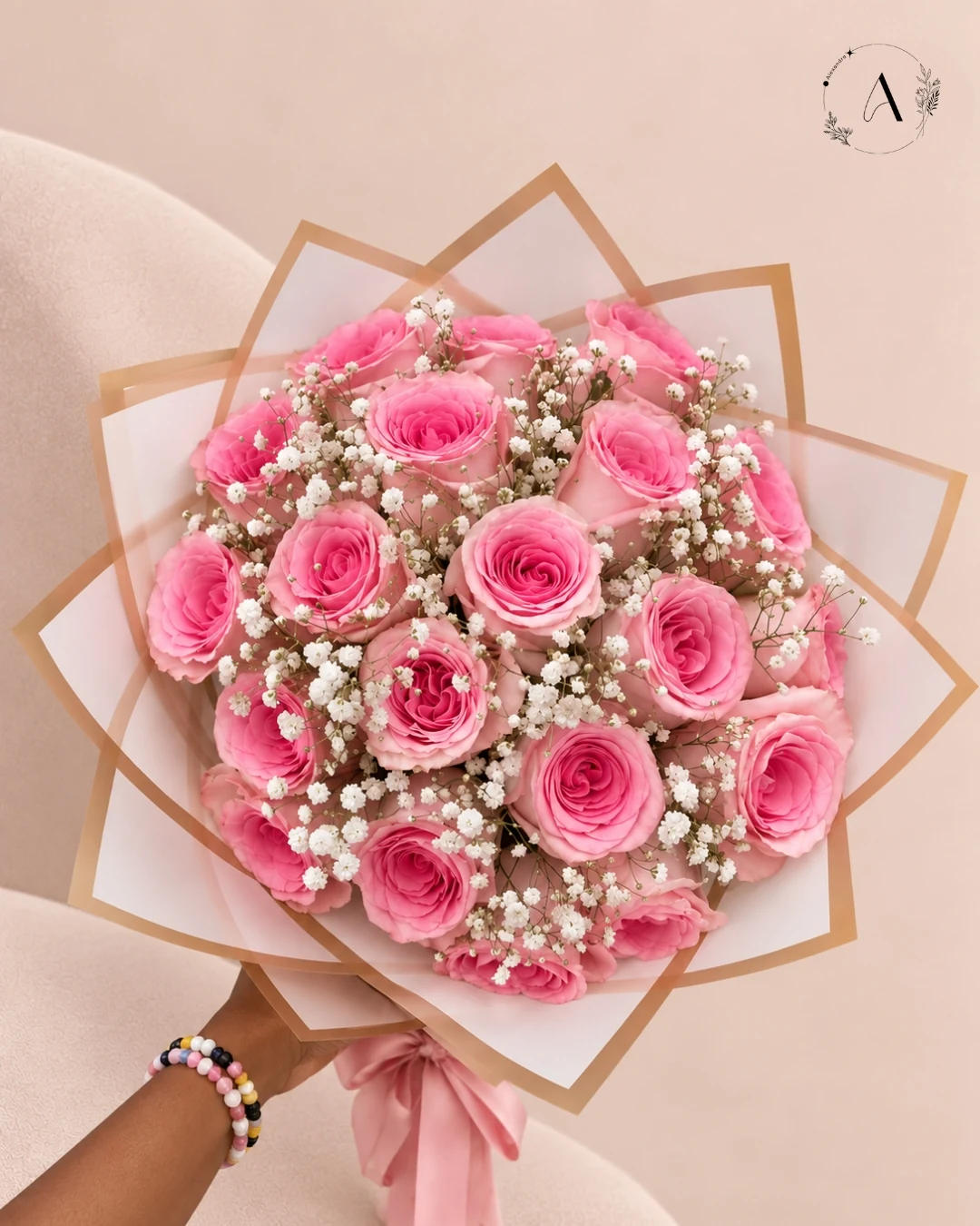 Pink roses with baby's breath bouquet