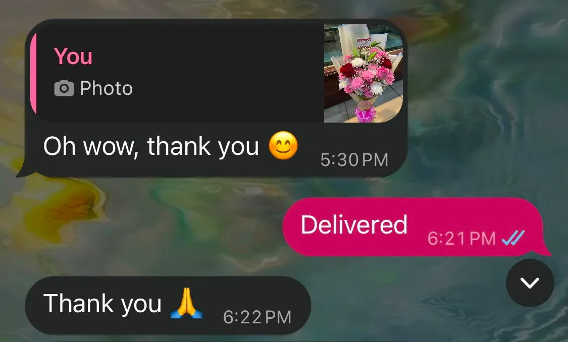 Customer WhatsApp message thanking Alexandra's Floral after receiving flowers