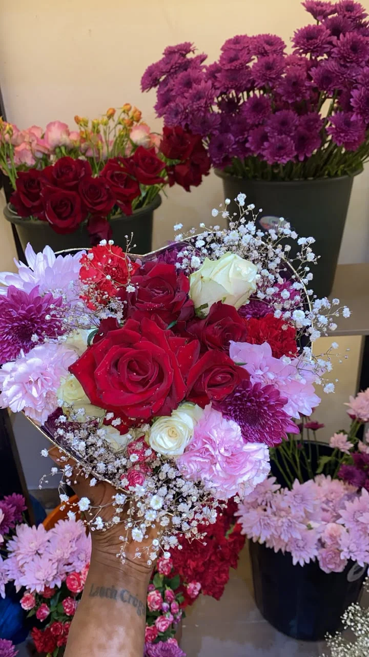 Fresh flowers arranged in buckets at Alexandra's Floral