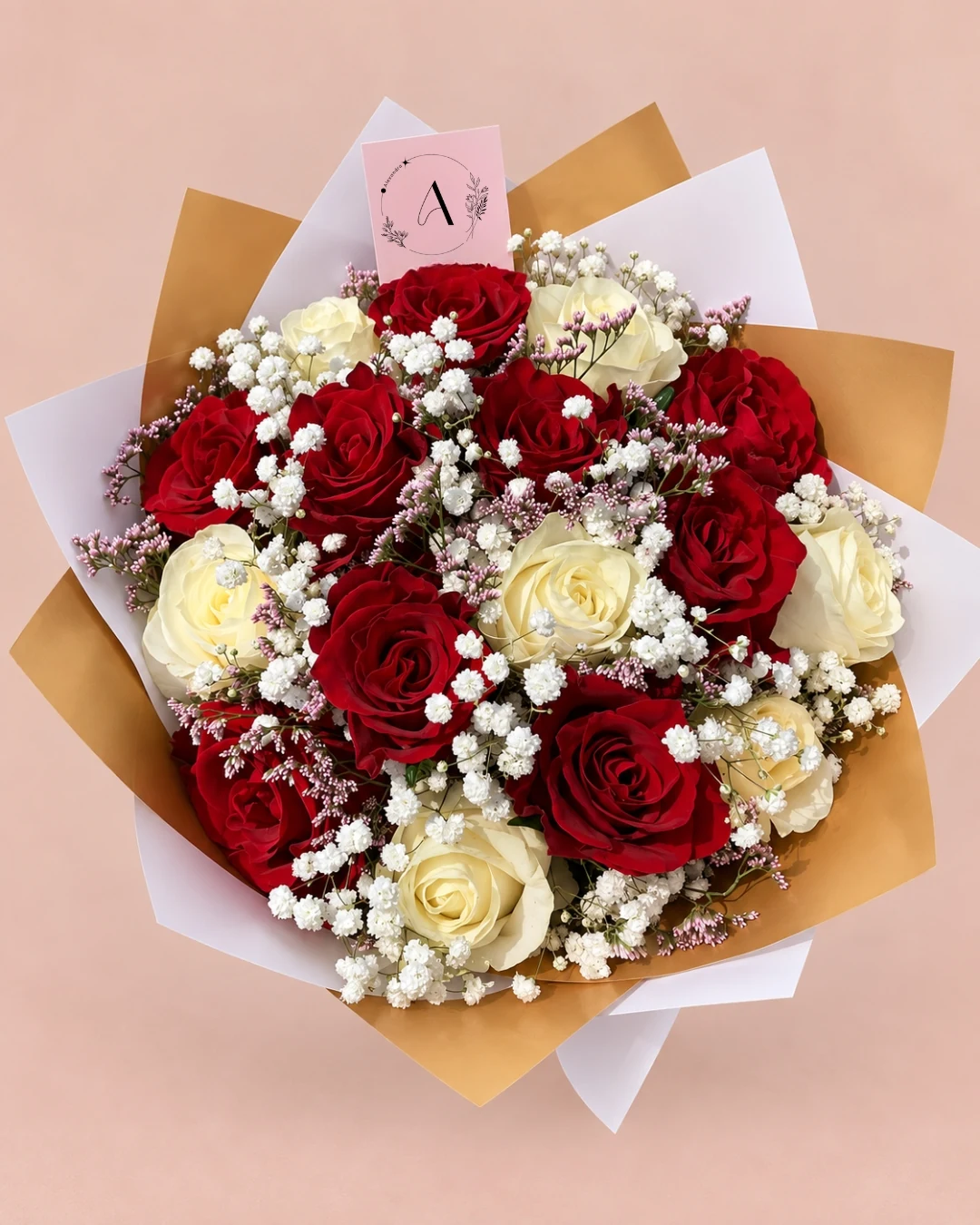 Red and white roses with baby's breath bouquet